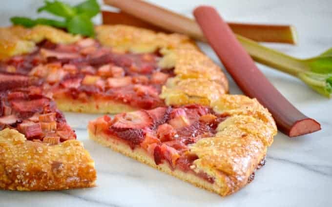 This Strawberry Rhubarb Galette is a flour and cornmeal crust filled with a strawberry-rhubarb filling. It's easy to make and is a perfect summer dessert.