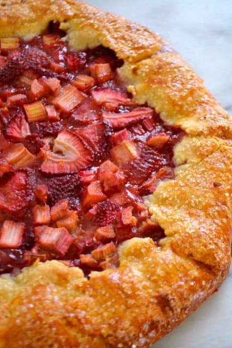 This Strawberry Rhubarb Galette is a flour and cornmeal crust filled with a strawberry-rhubarb filling. It's easy to make and is a perfect summer dessert.