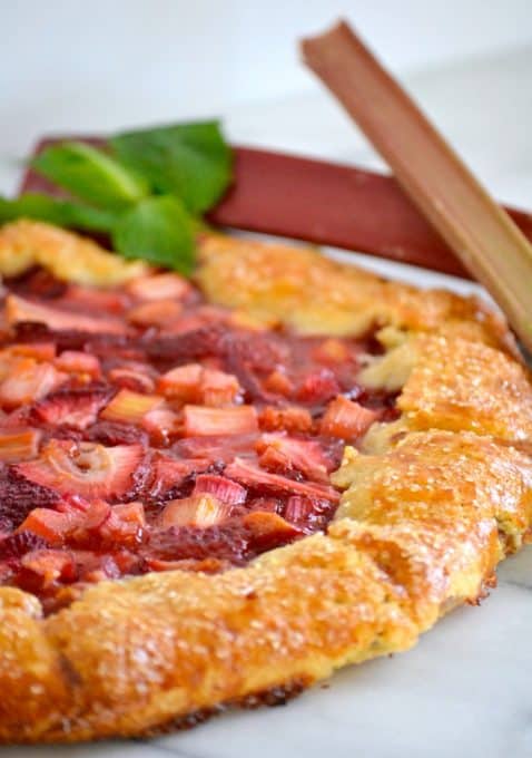 This Strawberry Rhubarb Galette is a flour and cornmeal crust filled with a strawberry-rhubarb filling. It's easy to make and is a perfect summer dessert.