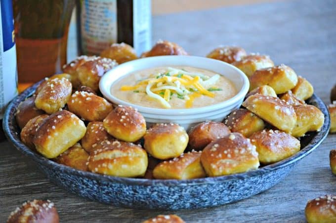 This Beer Cheese Dip and Homemade Pretzel Bites is a smooth, slightly spicy cheese dip with a touch of your favorite brew that goes perfectly with the easy homemade pretzel bites.