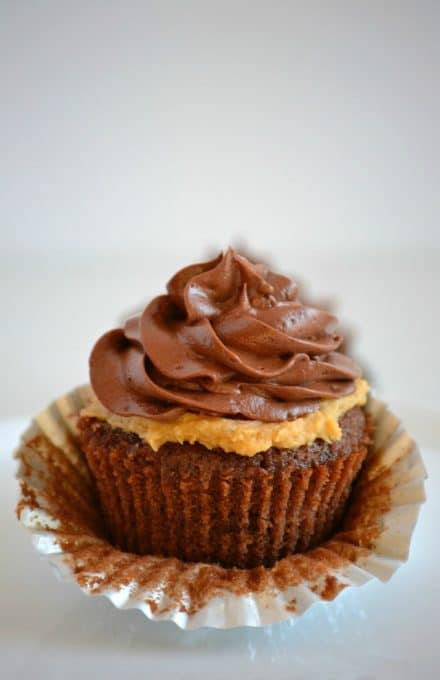 Double Chocolate Peanut Butter Filled Cupcakes - double chocolate cupcakes with a peanut butter cream center topped with chocolate buttercream.