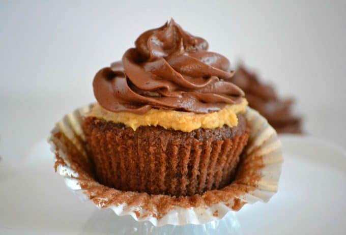 Double Chocolate Peanut Butter Filled Cupcakes - double chocolate cupcakes with a peanut butter cream center topped with chocolate buttercream.