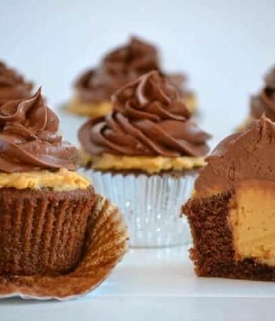 Double Chocolate Peanut Butter Filled Cupcakes - double chocolate cupcakes with a peanut butter cream center topped with chocolate buttercream.