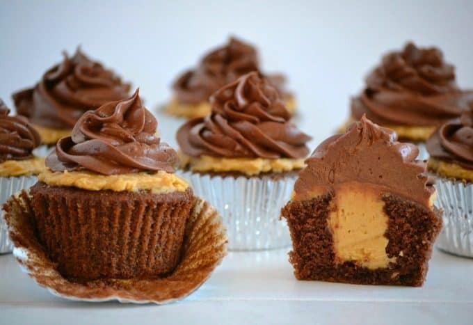 Double Chocolate Peanut Butter Filled Cupcakes - double chocolate cupcakes with a peanut butter cream center topped with chocolate buttercream.