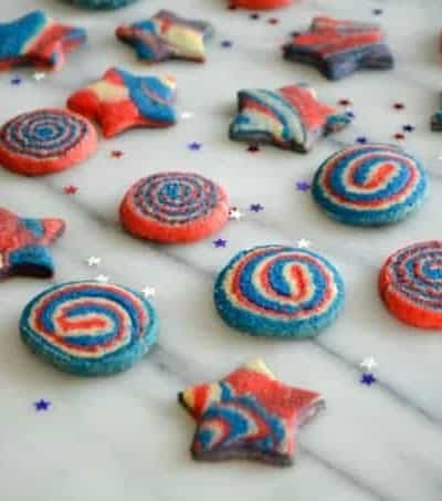 These Patriotic Pinwheel and Star Cookies are made from one sugar cookie dough with three colors to make your Patriotic celebration colorful and festive! 