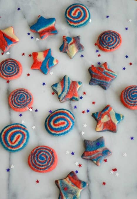 These Patriotic Pinwheel and Star Cookies are made from one sugar cookie dough with three colors to make your Patriotic celebration colorful and festive! 