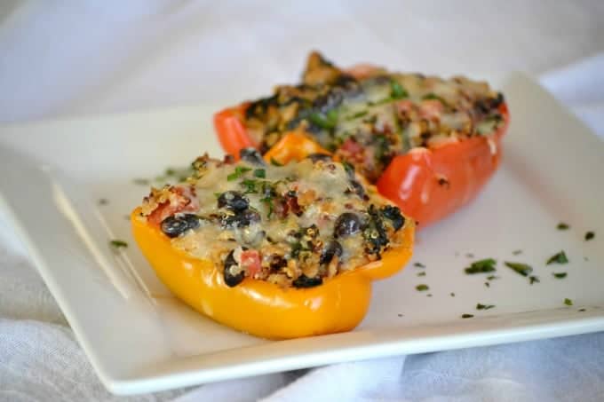 Quinoa, Black Bean and Turkey Stuffed Peppers - colorful bell peppers stuffed with quinoa, black beans and turkey that will satisfy any hungry appetite.