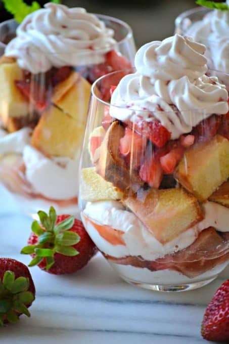 This Strawberries Lenox Shortcake is a simple and easy dessert made with a store bought pound cake, fresh whipped cream and fresh strawberries soaked in a flavorful syrup.