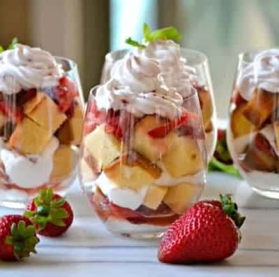 This Strawberries Lenox Shortcake is a simple and easy dessert made with a store bought pound cake, fresh whipped cream and fresh strawberries soaked in a flavorful syrup.