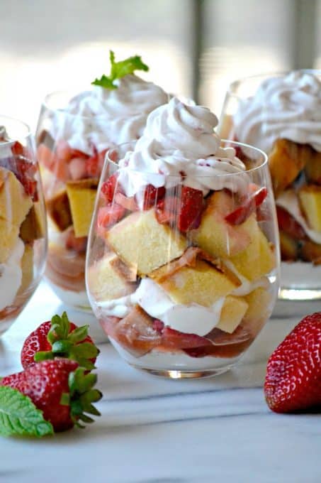 This Strawberries Lenox Shortcake is a simple and easy dessert made with a store bought pound cake, fresh whipped cream and fresh strawberries soaked in a flavorful syrup.