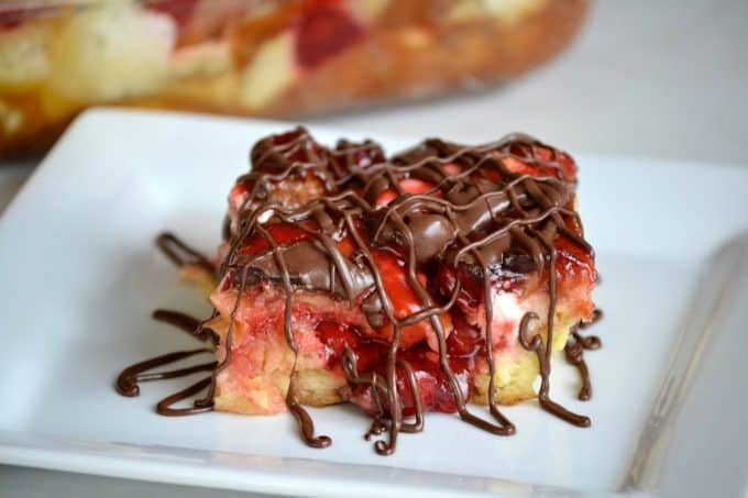 This Chocolate Cherry Cheesecake Bread PuddingÂ with French bread, cream cheese, cherry pie filling and chocolate drizzle make this a memorable dessert!