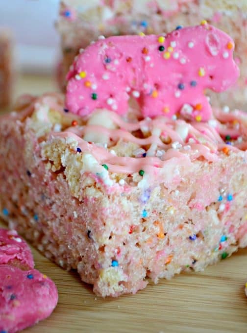 Circus Animal Cookie Rice Krispie Treats bring out your little kid with the crushed Circus Animal Cookies, colored nonpareils and drizzled chocolate.