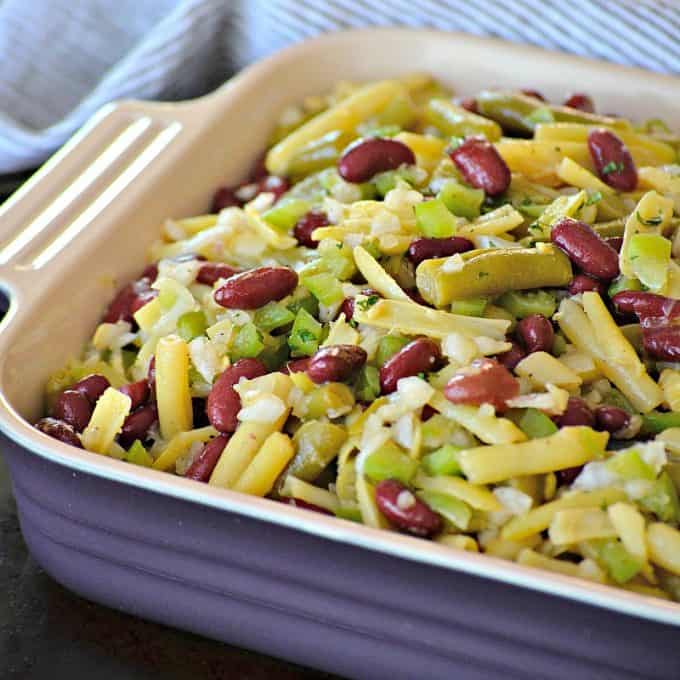 This Easy Three Bean Salad with green beans, wax beans and kidney beans marinated in a simple vinegar dressing is a great side dish with dinner for those hot summer nights.