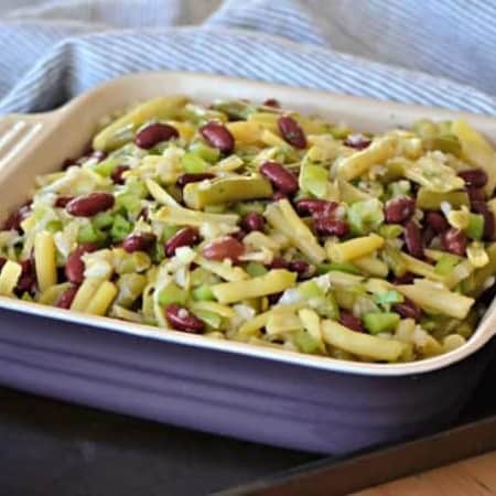 This Easy Three Bean Salad with green beans, wax beans and kidney beans marinated in a simple vinegar dressing is a great side dish with dinner for those hot summer nights.