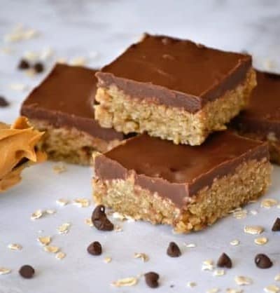 O'Henry Bars are a sweet oatmeal base topped with chocolate and peanut butter - a great after-school snack or a delicious addition to holiday cookie trays!