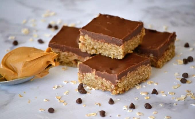 O'Henry Bars are a sweet oatmeal base topped with chocolate and peanut butter - a great after-school snack or a delicious addition to holiday cookie trays!