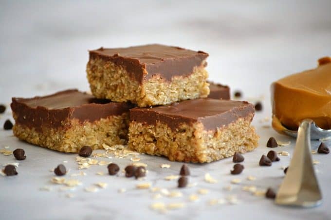 O'Henry Bars are a sweet oatmeal base topped with chocolate and peanut butter - a great after-school snack or a delicious addition to holiday cookie trays!