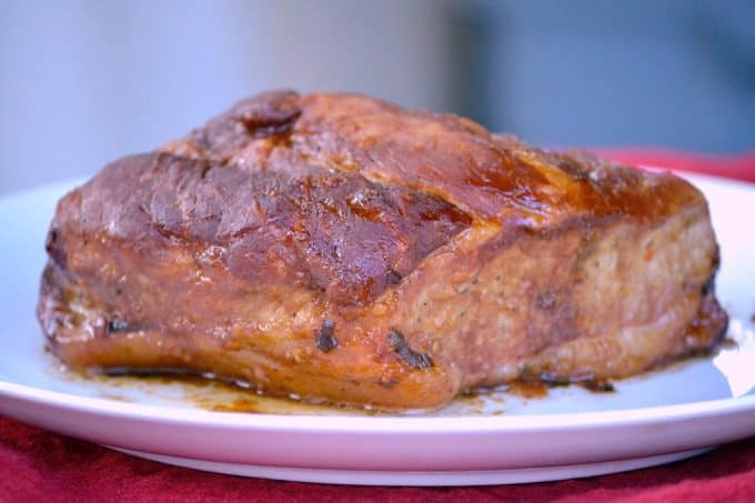 This Slow Cooker Spicy Orange Pork Roast uses the slow cooker to make an easy pork roast with lots of great flavor! Eat it sliced or shred it to use in lettuce wraps.