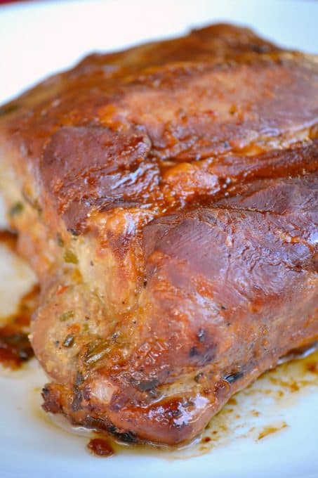 This Slow Cooker Spicy Orange Pork Roast uses the slow cooker to make an easy pork roast with lots of great flavor! Eat it sliced or shred it to use in lettuce wraps.