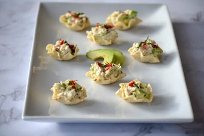 These Avocado Tuna Salad Bites sprinkled with a few chives and chili pepper flakes pack just enough kick and are the perfect addition to your party or Game Day menu.