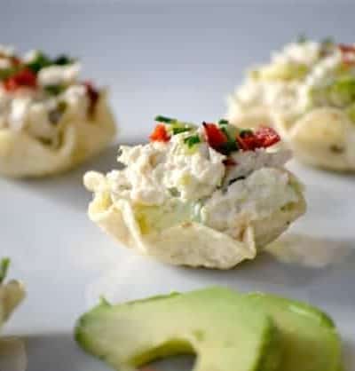 These Avocado Tuna Salad Bites sprinkled with a few chives and chili pepper flakes pack just enough kick and are the perfect addition to your party or Game Day menu.