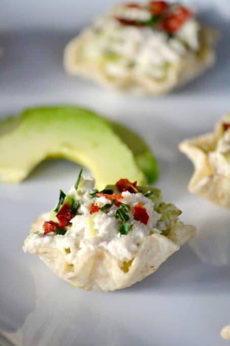 These Avocado Tuna Salad Bites sprinkled with a few chives and chili pepper flakes pack just enough kick and are the perfect addition to your party or Game Day menu.