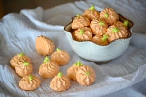 Pumpkin Spice Meringue Pumpkins - flavored with the great taste of Fall, this colorful treat will please both kids and adults. They’ll be the perfect addition to your Halloween or Thanksgiving dessert tables!