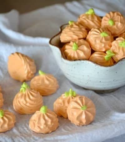 Pumpkin Spice Meringue Pumpkins - flavored with the great taste of Fall, this colorful treat will please both kids and adults. They’ll be the perfect addition to your Halloween or Thanksgiving dessert tables!