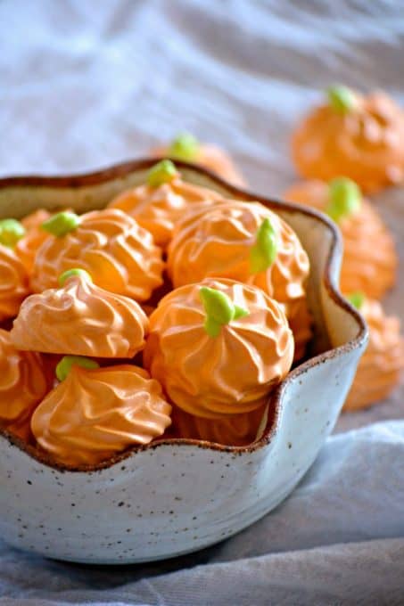 Pumpkin Spice Meringue Pumpkins - flavored with the great taste of Fall, this colorful treat will please both kids and adults. They’ll be the perfect addition to your Halloween or Thanksgiving dessert tables!