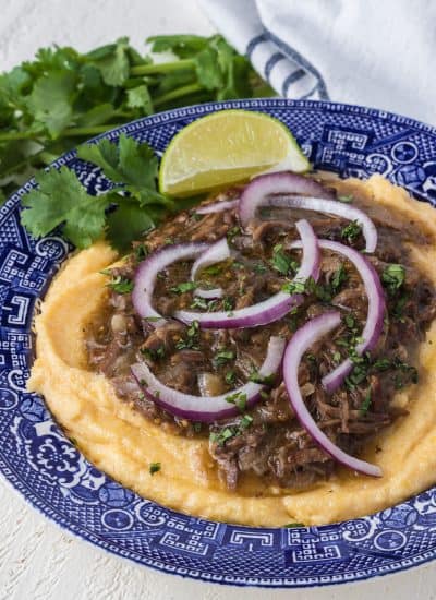 Creamy polenta topped with beef short ribs.