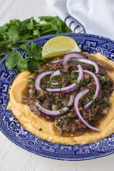 Creamy polenta topped with beef short ribs.