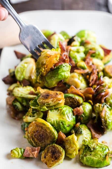 Brussels sprouts and bacon on a fork.