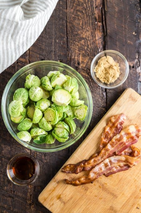 Ingredients to cook Brussels sprouts with maple syrup and bacon.