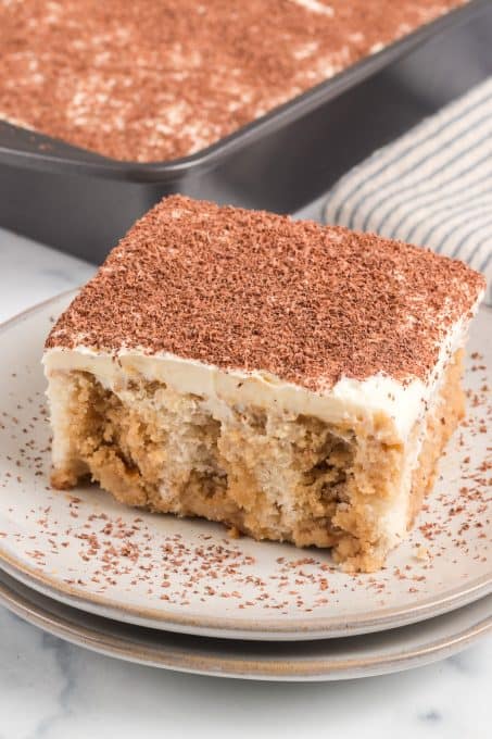 White Poke cake with coffee syrup and mascarpone frosting.