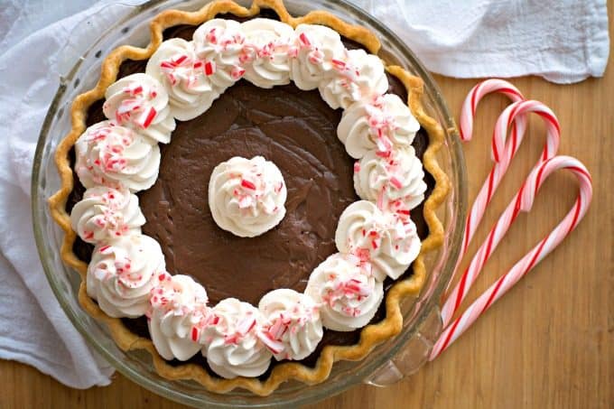 This Chocolate Peppermint Cream Pie is sure to be a big crowd pleaser during the holidays with its' smooth creamy chocolate filling and McCormick Pure Peppermint Extract. Santa might even choose this over cookies!