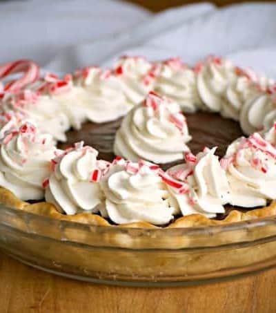 This Chocolate Peppermint Cream Pie is sure to be a big crowd pleaser during the holidays with its' smooth creamy chocolate filling and McCormick Pure Peppermint Extract. Santa might even choose this over cookies!