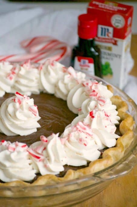 This Chocolate Peppermint Cream Pie is sure to be a big crowd pleaser during the holidays with its' smooth creamy chocolate filling and McCormick Pure Peppermint Extract. Santa might even choose this over cookies!