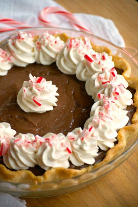 This Chocolate Peppermint Cream Pie is sure to be a big crowd pleaser during the holidays with its' smooth creamy chocolate filling and McCormick Pure Peppermint Extract. Santa might even choose this over cookies!