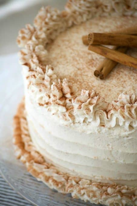 This Cinnamon Roll Layer Cake is a three layer cake with each layer covered in a cinnamon glaze and completely frosted with a incredible cinnamon frosting. A great recipe in Lindsay Conchar's (founder of the blog Life, Love and Sugar) new cookbook, Simply Beautiful Homemade Cakes: Extraordinary Recipes and Easy Decorating Techniques.