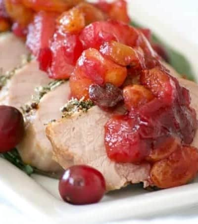 This Dijon Herb Roasted Pork with Cranberry Pear Chutney made with a Smithfield Prime Pork Tenderloin is an easy and delicious dinner perfectly suited for holiday entertaining!