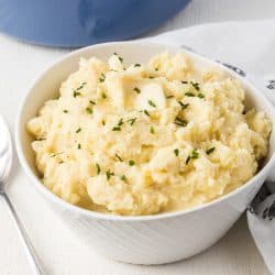 A bowl of mashed potatoes flavored with vanilla bean paste.