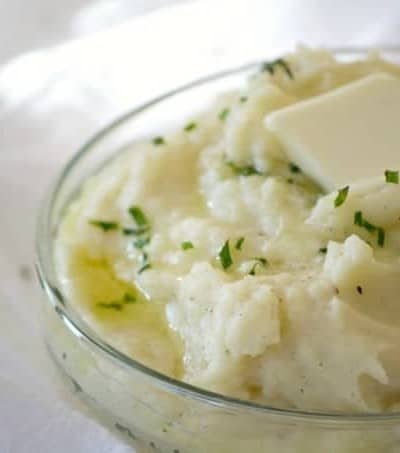These Vanilla Mashed Potatoes are your classic mashed potatoes made even better with mascarpone and vanilla paste. The perfect complement to beef or turkey!