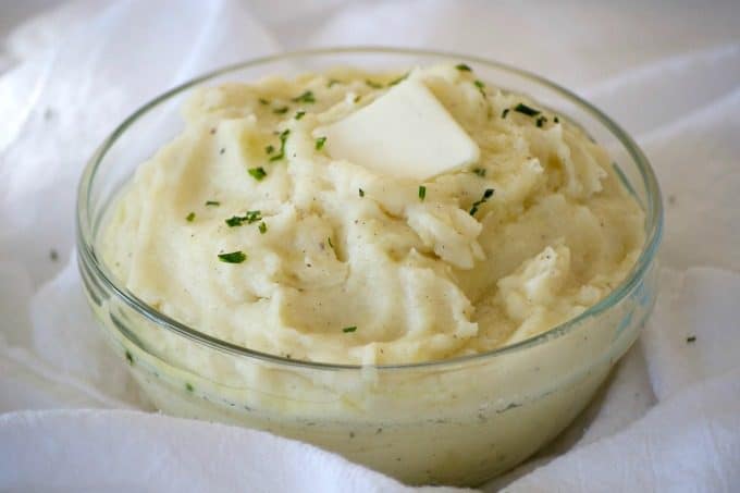 These Vanilla Mashed Potatoes are your classic mashed potatoes made even better with mascarpone and vanilla paste. The perfect complement to beef or turkey!