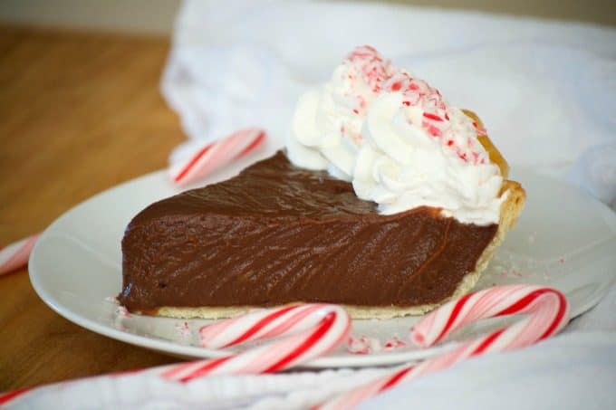 This Chocolate Peppermint Cream Pie is sure to be a big crowd pleaser during the holidays with its' smooth creamy chocolate filling and McCormick Pure Peppermint Extract. Santa might even choose this over cookies!