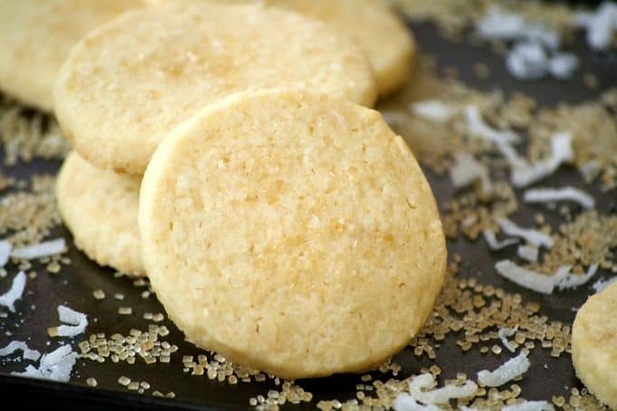 This Coconut Macadamia Nut Shortbread is a butter shortbread cookie with shredded coconut and macadamia nuts to remind you of the tropics.