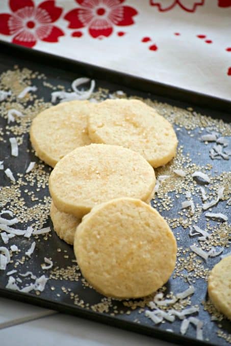 This Coconut Macadamia Nut Shortbread is a butter shortbread cookie with shredded coconut and macadamia nuts to remind you of the tropics.