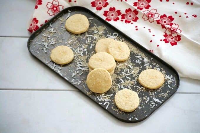 This Coconut Macadamia Nut Shortbread is a butter shortbread cookie with shredded coconut and macadamia nuts to remind you of the tropics.