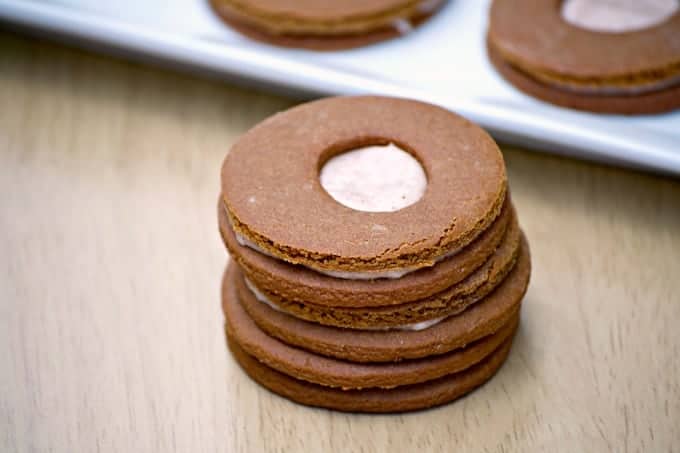 These Cream-Filled Molasses Cookies are a tasty gingerbread sandwich cookie with a cinnamon cream filling in the middle. They're great with a glass of milk!