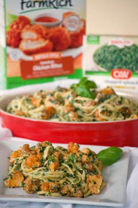 This Buffalo Chicken Spinach Alfredo with Buffalo chicken, chopped spinach, pasta and a homemade Alfredo sauce is an easy dinner that the family will love.