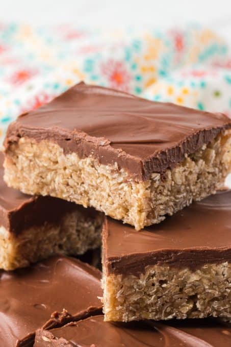 Chocolate Peanut Butter top a chewy bar made of oats.